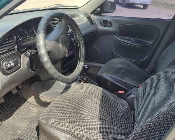 Зеленый Дэу Сенс, объемом двигателя 1.5 л и пробегом 225 тыс. км за 2700 $, фото 2 на Automoto.ua