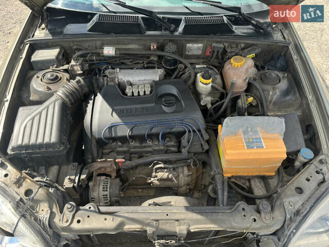 Зелений Деу Сенс, об'ємом двигуна 1.3 л та пробігом 207 тис. км за 1000 $, фото 10 на Automoto.ua