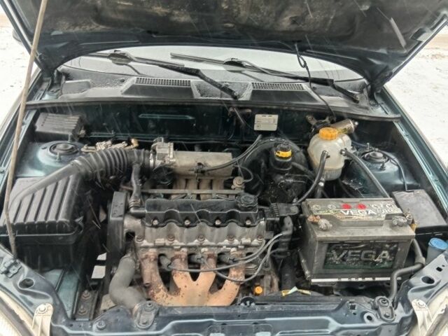 Зелений Деу Сенс, об'ємом двигуна 1.5 л та пробігом 220 тис. км за 1400 $, фото 4 на Automoto.ua