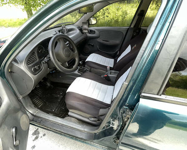 Зелений Деу Сенс, об'ємом двигуна 1.3 л та пробігом 220 тис. км за 1400 $, фото 7 на Automoto.ua