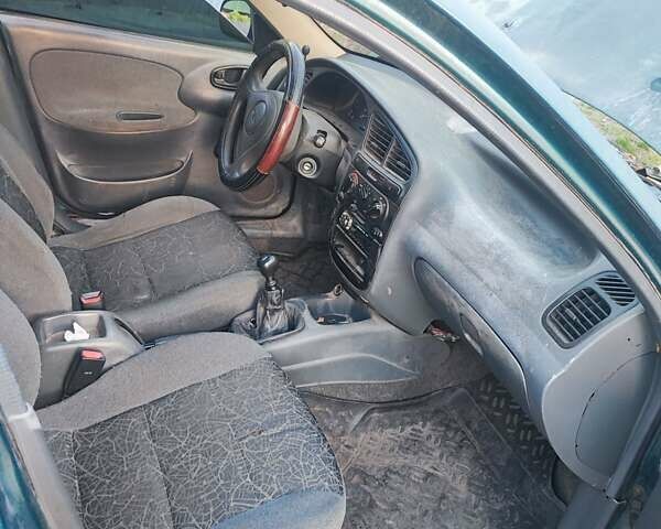 Зелений Деу Сенс, об'ємом двигуна 1.3 л та пробігом 200 тис. км за 1200 $, фото 1 на Automoto.ua