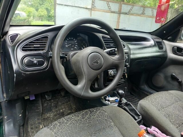 Зелений Деу Сенс, об'ємом двигуна 1.3 л та пробігом 204 тис. км за 1000 $, фото 19 на Automoto.ua