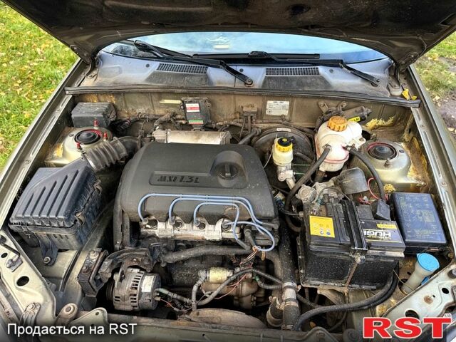 Зелений Деу Сенс, об'ємом двигуна 1.3 л та пробігом 275 тис. км за 1750 $, фото 9 на Automoto.ua