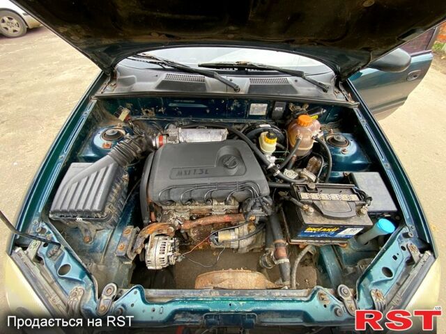 Зелений Деу Сенс, об'ємом двигуна 1.3 л та пробігом 224 тис. км за 1500 $, фото 11 на Automoto.ua