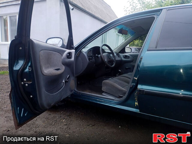 Зеленый Дэу Сенс, объемом двигателя 1.3 л и пробегом 200 тыс. км за 1700 $, фото 2 на Automoto.ua