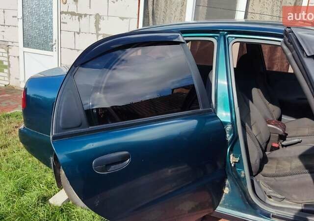 Зелений Деу Сенс, об'ємом двигуна 1.3 л та пробігом 120 тис. км за 2000 $, фото 53 на Automoto.ua