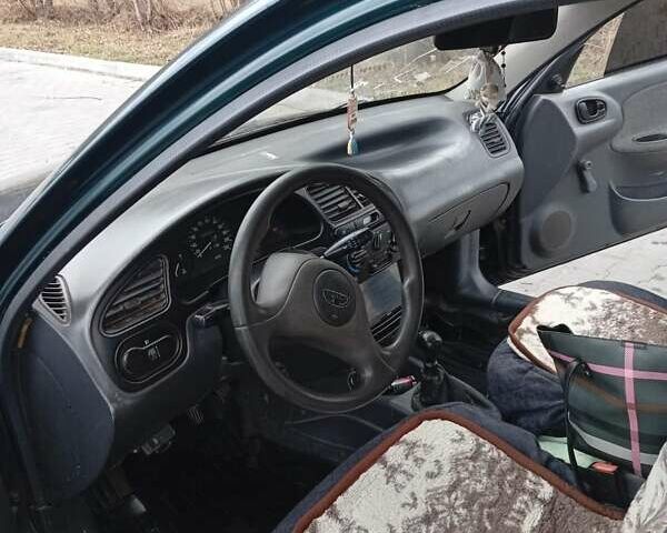 Зеленый Дэу Сенс, объемом двигателя 1.3 л и пробегом 220 тыс. км за 1200 $, фото 5 на Automoto.ua