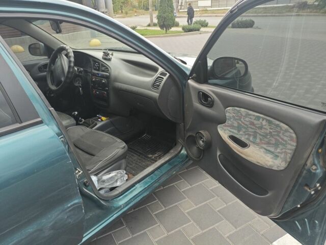 Зелений Деу Сенс, об'ємом двигуна 1.5 л та пробігом 430 тис. км за 1800 $, фото 5 на Automoto.ua