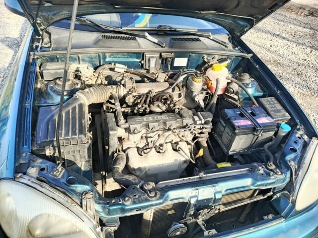 Зелений Деу Сенс, об'ємом двигуна 1.5 л та пробігом 182 тис. км за 1999 $, фото 4 на Automoto.ua