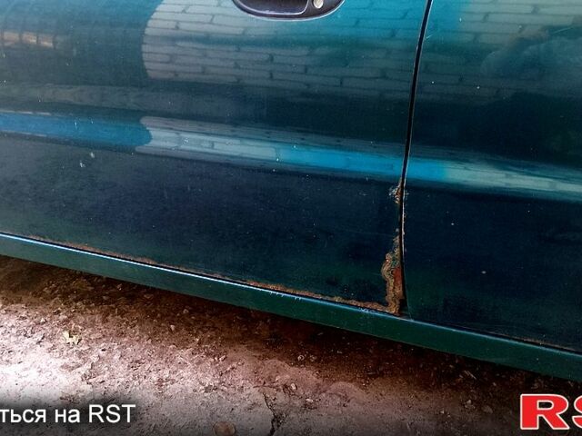 Зелений Деу Сенс, об'ємом двигуна 1.4 л та пробігом 251 тис. км за 1000 $, фото 4 на Automoto.ua