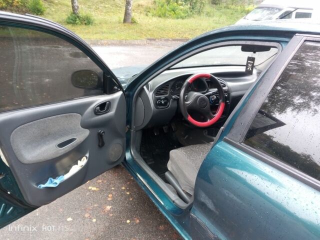 Зеленый Дэу Сенс, объемом двигателя 1.5 л и пробегом 257 тыс. км за 1000 $, фото 7 на Automoto.ua