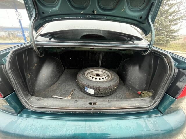 Зеленый Дэу Сенс, объемом двигателя 1.4 л и пробегом 198 тыс. км за 1999 $, фото 16 на Automoto.ua