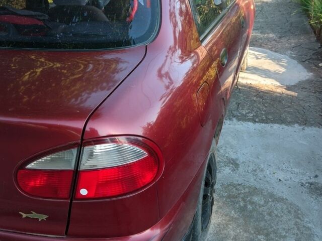 Красный Дэу T13110, объемом двигателя 1.3 л и пробегом 235 тыс. км за 1600 $, фото 1 на Automoto.ua