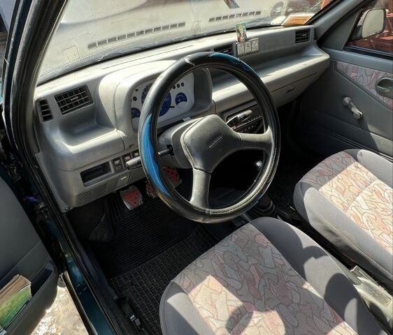 Зеленый Дэу Тико, объемом двигателя 0.8 л и пробегом 127 тыс. км за 1200 $, фото 6 на Automoto.ua