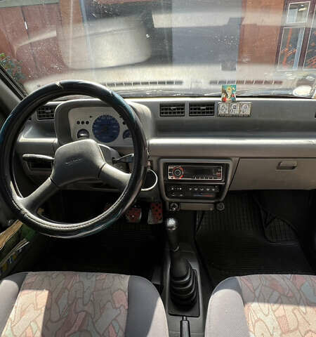 Зеленый Дэу Тико, объемом двигателя 0.8 л и пробегом 127 тыс. км за 1200 $, фото 7 на Automoto.ua