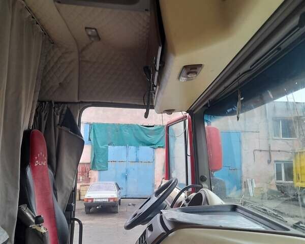 Красный Даф XF 105, объемом двигателя 12.9 л и пробегом 800 тыс. км за 18000 $, фото 1 на Automoto.ua