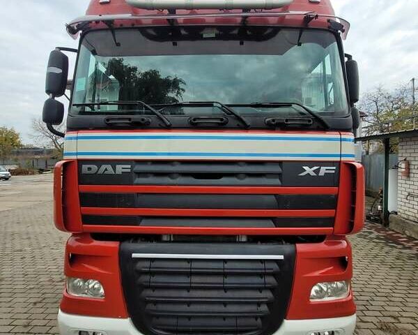 Красный Даф XF 105, объемом двигателя 12.9 л и пробегом 929 тыс. км за 12000 $, фото 1 на Automoto.ua