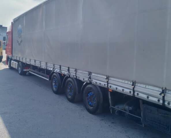 Красный Даф XF 105, объемом двигателя 12.9 л и пробегом 990 тыс. км за 15000 $, фото 6 на Automoto.ua