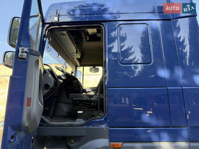 Синий Даф XF 105, объемом двигателя 12.9 л и пробегом 965 тыс. км за 10500 $, фото 3 на Automoto.ua