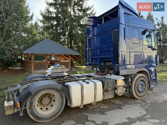 Синий Даф XF 105, объемом двигателя 12.9 л и пробегом 965 тыс. км за 10500 $, фото 1 на Automoto.ua