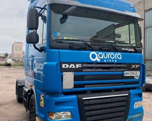 Синий Даф XF 105, объемом двигателя 12.9 л и пробегом 875 тыс. км за 15000 $, фото 1 на Automoto.ua