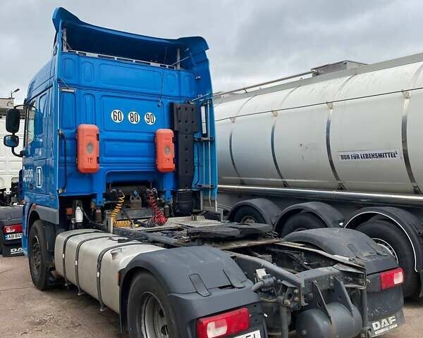 Синий Даф XF 105, объемом двигателя 12.9 л и пробегом 875 тыс. км за 15000 $, фото 3 на Automoto.ua