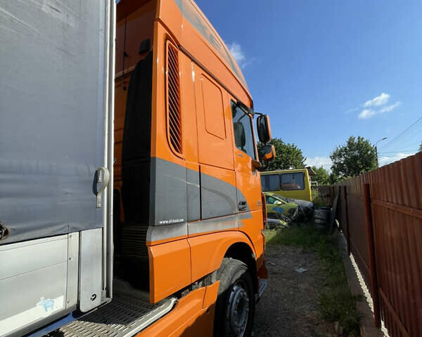 Оранжевый Даф XF 460 FT, объемом двигателя 12.9 л и пробегом 587 тыс. км за 28000 $, фото 2 на Automoto.ua