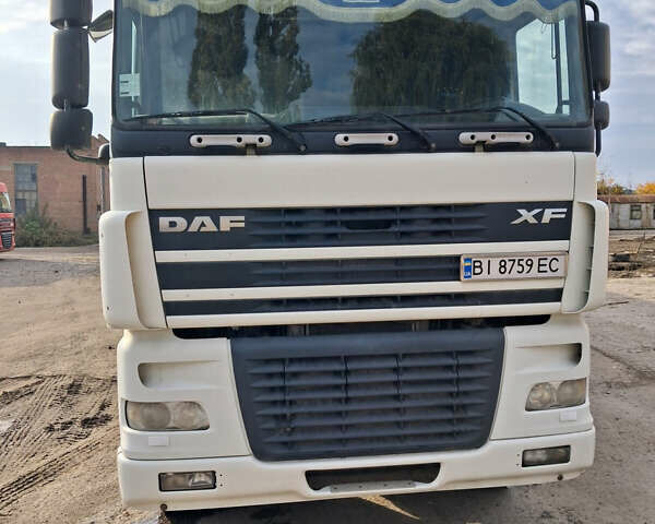 Белый Даф XF 95, объемом двигателя 12.58 л и пробегом 100 тыс. км за 14900 $, фото 1 на Automoto.ua