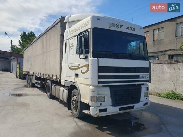Белый Даф XF 95, объемом двигателя 12.6 л и пробегом 400 тыс. км за 5000 $, фото 1 на Automoto.ua