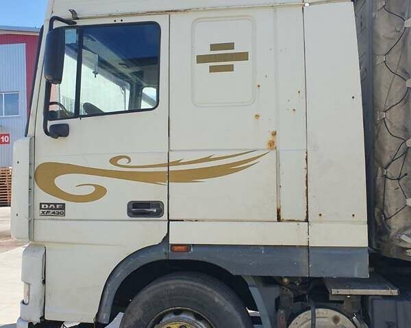 Белый Даф XF 95, объемом двигателя 12.6 л и пробегом 400 тыс. км за 5000 $, фото 3 на Automoto.ua