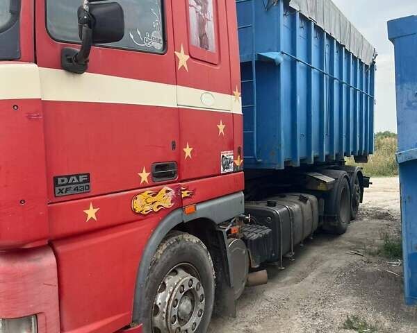 Червоний Даф XF 95, об'ємом двигуна 12.58 л та пробігом 616 тис. км за 24000 $, фото 1 на Automoto.ua