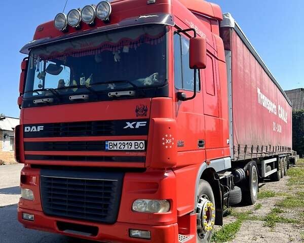 Красный Даф XF 95, объемом двигателя 12.6 л и пробегом 1000 тыс. км за 10000 $, фото 3 на Automoto.ua