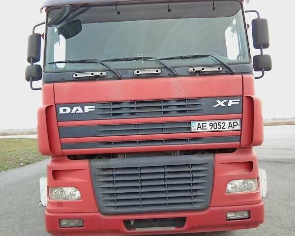 Красный Даф XF 95, объемом двигателя 12.58 л и пробегом 2 тыс. км за 10000 $, фото 1 на Automoto.ua