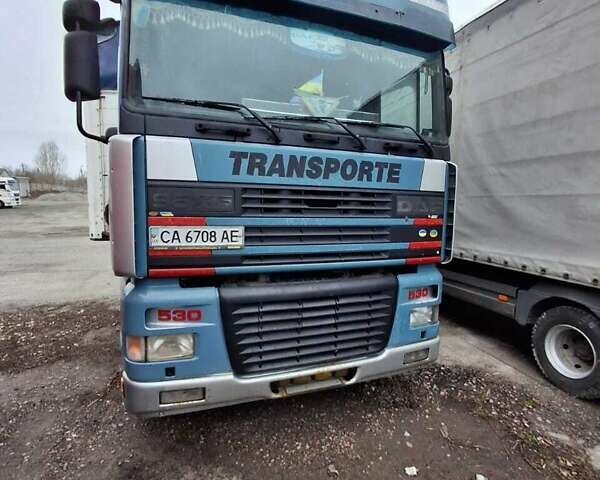 Синий Даф XF 95, объемом двигателя 12.58 л и пробегом 680 тыс. км за 15000 $, фото 1 на Automoto.ua