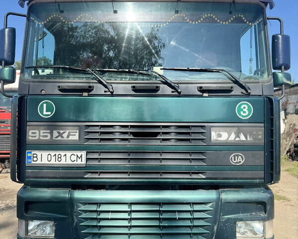 Зеленый Даф XF 95, объемом двигателя 12.58 л и пробегом 200 тыс. км за 18500 $, фото 1 на Automoto.ua