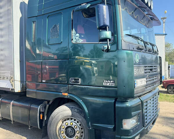 Зеленый Даф XF 95, объемом двигателя 12.58 л и пробегом 200 тыс. км за 18500 $, фото 2 на Automoto.ua