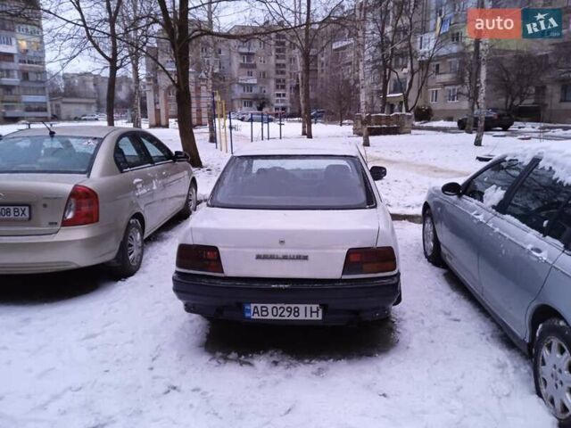 Білий Дайхатсу Applause, об'ємом двигуна 1.6 л та пробігом 200 тис. км за 1700 $, фото 1 на Automoto.ua