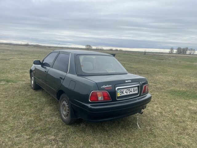 Зеленый Дайхатсу Апплауз, объемом двигателя 1.6 л и пробегом 306 тыс. км за 1500 $, фото 6 на Automoto.ua