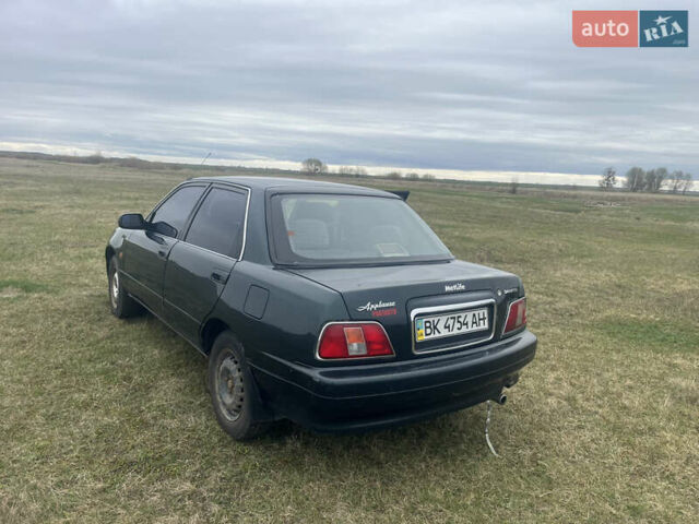 Зелений Дайхатсу Applause, об'ємом двигуна 1.59 л та пробігом 306 тис. км за 1500 $, фото 2 на Automoto.ua