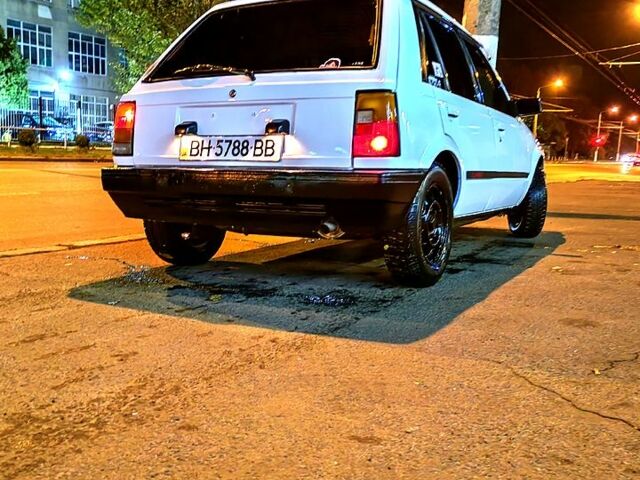 Белый Дайхатсу Шарада, объемом двигателя 1 л и пробегом 400 тыс. км за 550 $, фото 2 на Automoto.ua