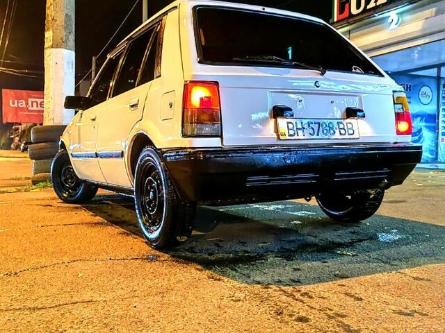 Белый Дайхатсу Шарада, объемом двигателя 1 л и пробегом 400 тыс. км за 550 $, фото 1 на Automoto.ua