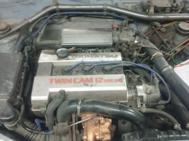 Черный Дайхатсу Шарада, объемом двигателя 1 л и пробегом 200 тыс. км за 239 $, фото 1 на Automoto.ua