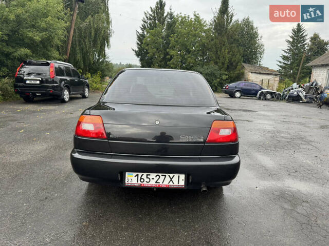 Чорний Дайхатсу Charade, об'ємом двигуна 1.5 л та пробігом 245 тис. км за 2650 $, фото 2 на Automoto.ua