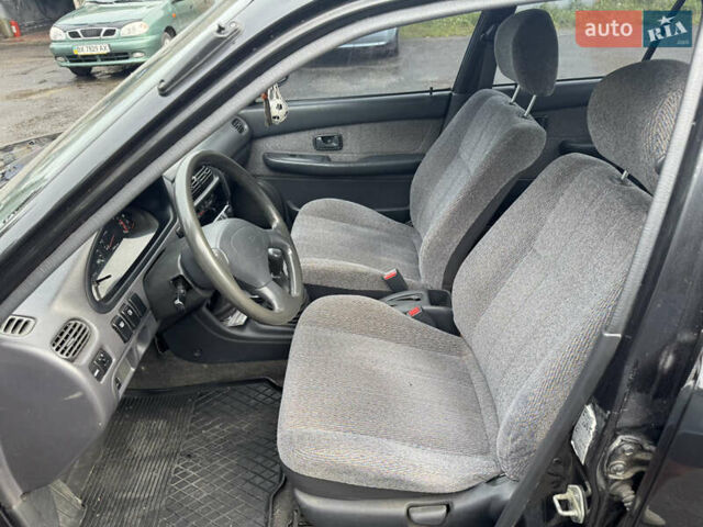 Чорний Дайхатсу Charade, об'ємом двигуна 1.5 л та пробігом 245 тис. км за 2650 $, фото 6 на Automoto.ua