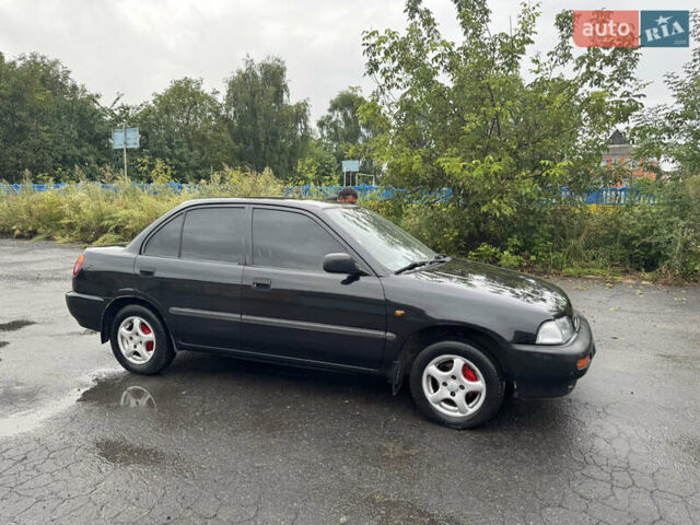 Чорний Дайхатсу Charade, об'ємом двигуна 1.5 л та пробігом 245 тис. км за 2650 $, фото 14 на Automoto.ua
