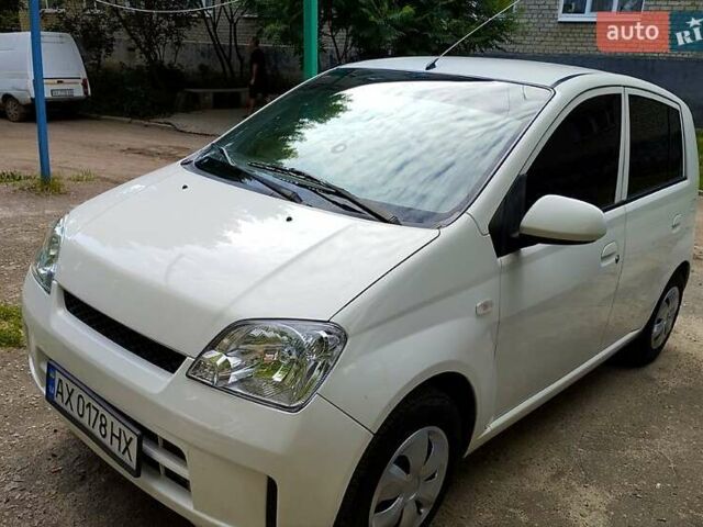 Белый Дайхатсу Куоре, объемом двигателя 1 л и пробегом 222 тыс. км за 4000 $, фото 8 на Automoto.ua