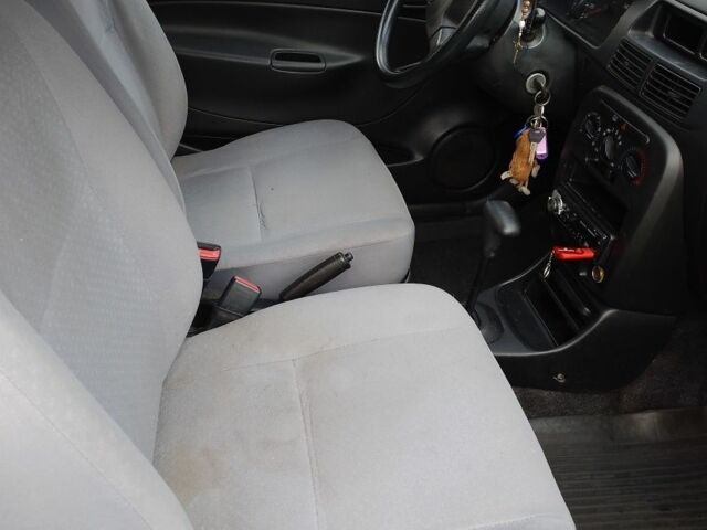 Черный Дайхатсу Куоре, объемом двигателя 1 л и пробегом 122 тыс. км за 3500 $, фото 4 на Automoto.ua