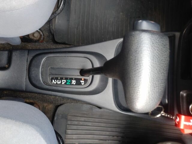 Черный Дайхатсу Куоре, объемом двигателя 1 л и пробегом 122 тыс. км за 3500 $, фото 5 на Automoto.ua