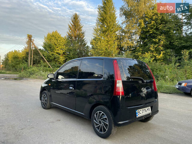 Чорний Дайхатсу Cuore, об'ємом двигуна 0.99 л та пробігом 185 тис. км за 3200 $, фото 5 на Automoto.ua