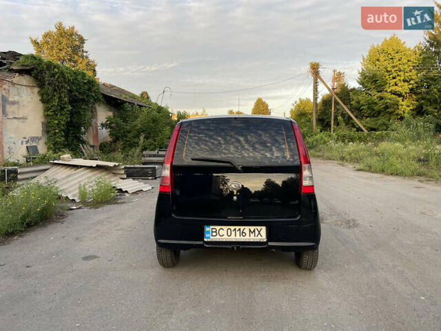 Чорний Дайхатсу Cuore, об'ємом двигуна 0.99 л та пробігом 185 тис. км за 3200 $, фото 4 на Automoto.ua